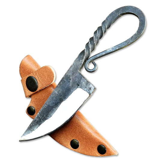 Celtic-style knife with a patterned steel blade and decorative handle, displayed on a neutral background to highlight its intricate craftsmanship.