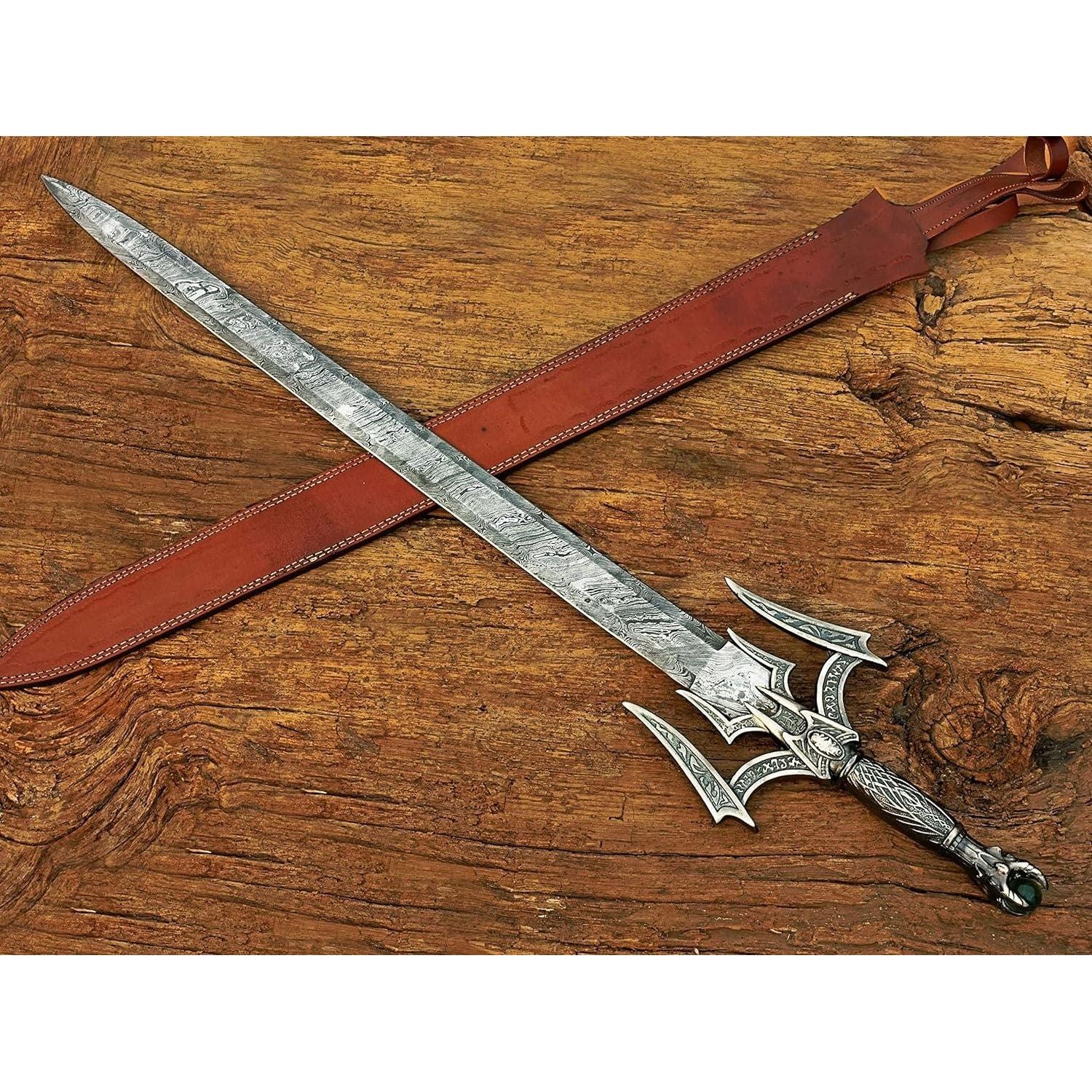 amascus steel medieval barbarian sword featuring a patterned Damascus blade, rugged warrior design, and fantasy style hilt inspired by ancient barbarian weapons